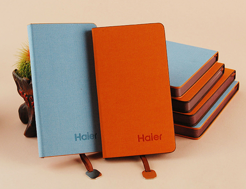 What is the difference between imitation leather notepad and genuine leather notepad