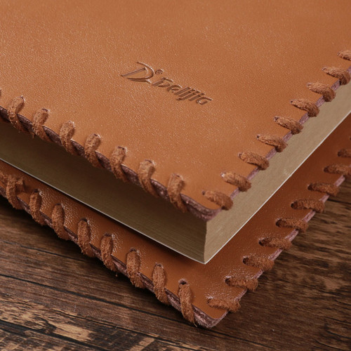 What is the specific size of the leather notebook 25?